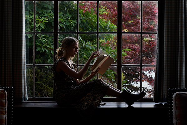 A woman alone reading