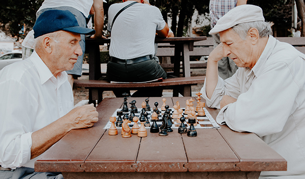 Two old friends playing chess