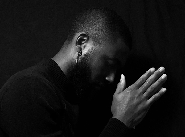 A Black man dealing with stress