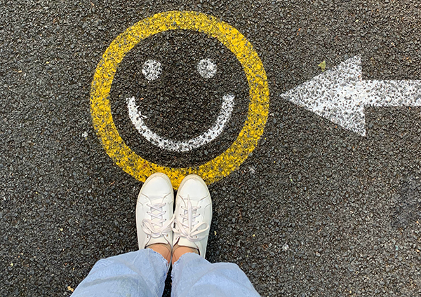 A happy face painted on the ground. 