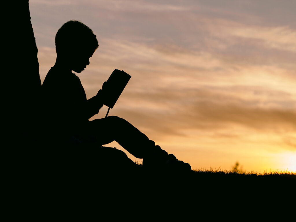 A young boy reading